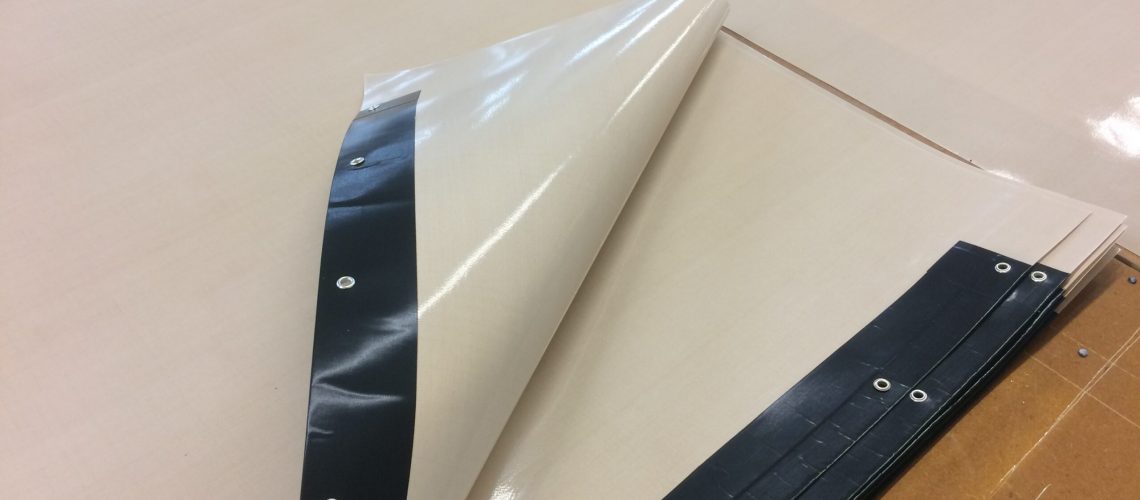 Tracking eyelets for PTFE Belts
